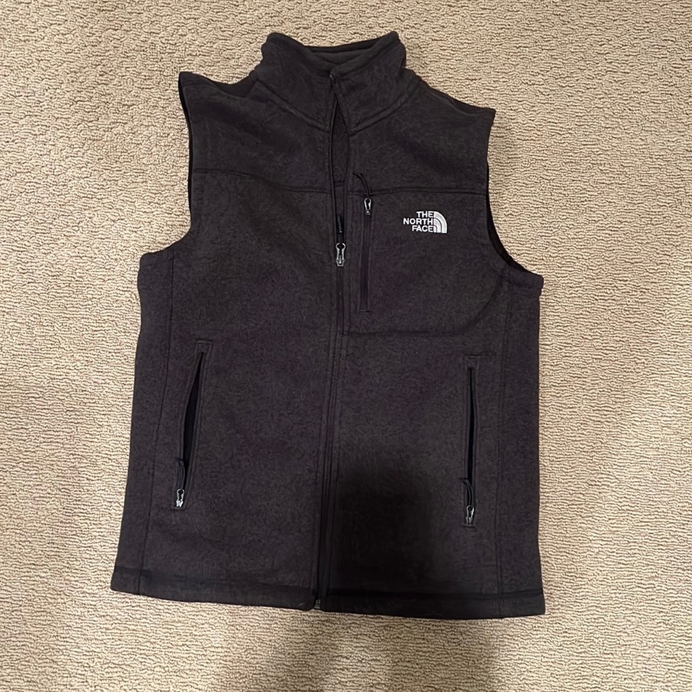 North Face vest.  Worn once. Gray in color. Size men’s medium. Fleece interior.